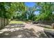 Large backyard with a deck, patio, and plenty of green space at 930 White St, Atlanta, GA 30310