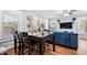 Bright dining area with hardwood floors and seating for four at 930 White St, Atlanta, GA 30310