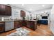 Modern kitchen with dark wood cabinets and stainless steel appliances at 930 White St, Atlanta, GA 30310