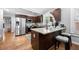 Updated kitchen with granite island and stainless steel appliances at 930 White St, Atlanta, GA 30310