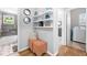 Convenient laundry room with washer, dryer, and shelving at 930 White St, Atlanta, GA 30310