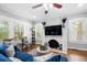 Living room features hardwood floors, fireplace and comfy seating at 930 White St, Atlanta, GA 30310