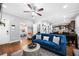 Open living room with hardwood floors and a view into the kitchen at 930 White St, Atlanta, GA 30310