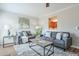 Relaxing living room, hardwood floors, and a view into the kitchen at 1000 Windy Oaks Se Ct, Smyrna, GA 30080