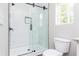 Walk-in shower with tile and glass door at 121 Hunters Ln, Powder Springs, GA 30127