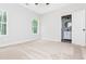Carpeted bedroom featuring an adjacent bathroom with a modern vanity at 121 Hunters Ln, Powder Springs, GA 30127