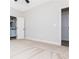 Spacious carpeted bedroom with an ensuite bathroom at 121 Hunters Ln, Powder Springs, GA 30127