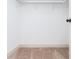 Walk-in closet with shelving and carpet at 121 Hunters Ln, Powder Springs, GA 30127