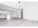 Open living area with modern kitchen and abundant natural light at 121 Hunters Ln, Powder Springs, GA 30127