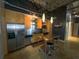 Modern kitchen with stainless steel appliances and an island at 1661 La France St # 102, Atlanta, GA 30307