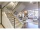 Contemporary staircase with metal railings and carpeted steps at 2454 Field Way, Brookhaven, GA 30319