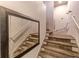 Modern staircase with mirror and carpet runner at 2454 Field Way, Brookhaven, GA 30319