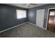 Gray walls and carpet in this spacious bedroom at 2842 Delowe Dr, Atlanta, GA 30344