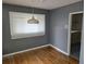 Simple dining room with hardwood floors and gray walls at 2842 Delowe Dr, Atlanta, GA 30344