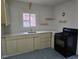 Updated kitchen featuring white countertops and gas range at 2842 Delowe Dr, Atlanta, GA 30344