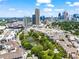 Aerial view showcasing a city neighborhood with a pond and bridge at 270 17Th Nw St # 809, Atlanta, GA 30363