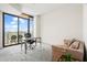 Bright home office features a large window, comfortable seating, and a workspace at 270 17Th Nw St # 809, Atlanta, GA 30363