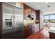 Modern kitchen with stainless steel appliances and dark wood cabinets at 270 17Th Nw St # 809, Atlanta, GA 30363