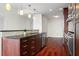Modern kitchen with island, granite countertops, and hardwood floors at 270 17Th Nw St # 809, Atlanta, GA 30363