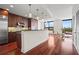 Open concept kitchen with hardwood floors, island, and city views at 270 17Th Nw St # 809, Atlanta, GA 30363