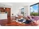 Living room with hardwood floors, large windows, and city views at 270 17Th Nw St # 809, Atlanta, GA 30363