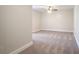 Spacious bedroom with ceiling fan and neutral carpet at 56 Veranda Walk, Dallas, GA 30157