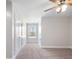 Charming bedroom with a window and ceiling fan at 56 Veranda Walk, Dallas, GA 30157