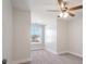 Well-lit bedroom with window and ceiling fan at 56 Veranda Walk, Dallas, GA 30157