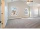 Spacious bedroom with carpeted floor and high ceilings at 56 Veranda Walk, Dallas, GA 30157