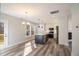 Bright dining area with hardwood floors and kitchen view at 56 Veranda Walk, Dallas, GA 30157
