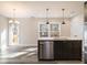 Modern kitchen with stainless steel appliances and a large island at 56 Veranda Walk, Dallas, GA 30157