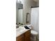 Clean bathroom with single sink vanity, shower/tub combo, and updated fixtures at 6977 Gallant Se Cir # 8, Mableton, GA 30126