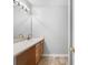 Bathroom with wood vanity and neutral color palette at 6977 Gallant Se Cir # 8, Mableton, GA 30126