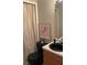 Bathroom with black vanity and toilet at 6977 Gallant Se Cir # 8, Mableton, GA 30126