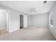 Bright and airy bedroom with carpeted floor and ceiling fan at 6977 Gallant Se Cir # 8, Mableton, GA 30126