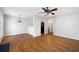 Open dining area with hardwood floors, chandelier, and access to patio at 6977 Gallant Se Cir # 8, Mableton, GA 30126
