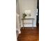 Bright entryway with wood floors and a console table at 6977 Gallant Se Cir # 8, Mableton, GA 30126