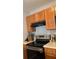 Kitchen boasts modern appliances and wood cabinets at 6977 Gallant Se Cir # 8, Mableton, GA 30126