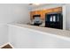 Kitchen with light countertops, wood cabinets, and black appliances at 6977 Gallant Se Cir # 8, Mableton, GA 30126