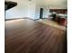 Open kitchen with dark brown cabinets and tiled floors at 1188 To Lani Path, Stone Mountain, GA 30083