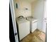 Laundry room with washer, dryer, and shelving at 1188 To Lani Path, Stone Mountain, GA 30083