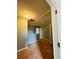 Upstairs hallway with access to bedrooms and attic at 1188 To Lani Path, Stone Mountain, GA 30083