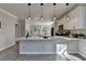 Bright kitchen with white cabinets, quartz countertops, and stainless steel appliances at 11675 Red Maple Forest Dr, Alpharetta, GA 30005