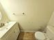 Simple bathroom with white vanity and tiled floor at 2884 Norfair Loop, Lithonia, GA 30038