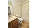 Clean bathroom, featuring a vanity, toilet, and bathtub at 2884 Norfair Loop, Lithonia, GA 30038