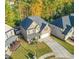 Aerial view showcasing home's curb appeal and neighborhood context at 552 Watercourse Way, Lawrenceville, GA 30046