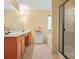 Bathroom with double vanity, garden tub, and separate shower at 552 Watercourse Way, Lawrenceville, GA 30046