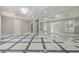 Spacious basement room with marble flooring and mirrored walls at 630 Darlington Commons Ne Ct, Atlanta, GA 30305