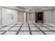 Finished basement with marble floors and multiple room access at 630 Darlington Commons Ne Ct, Atlanta, GA 30305