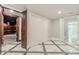 Basement hallway with marble flooring and access to other rooms at 630 Darlington Commons Ne Ct, Atlanta, GA 30305